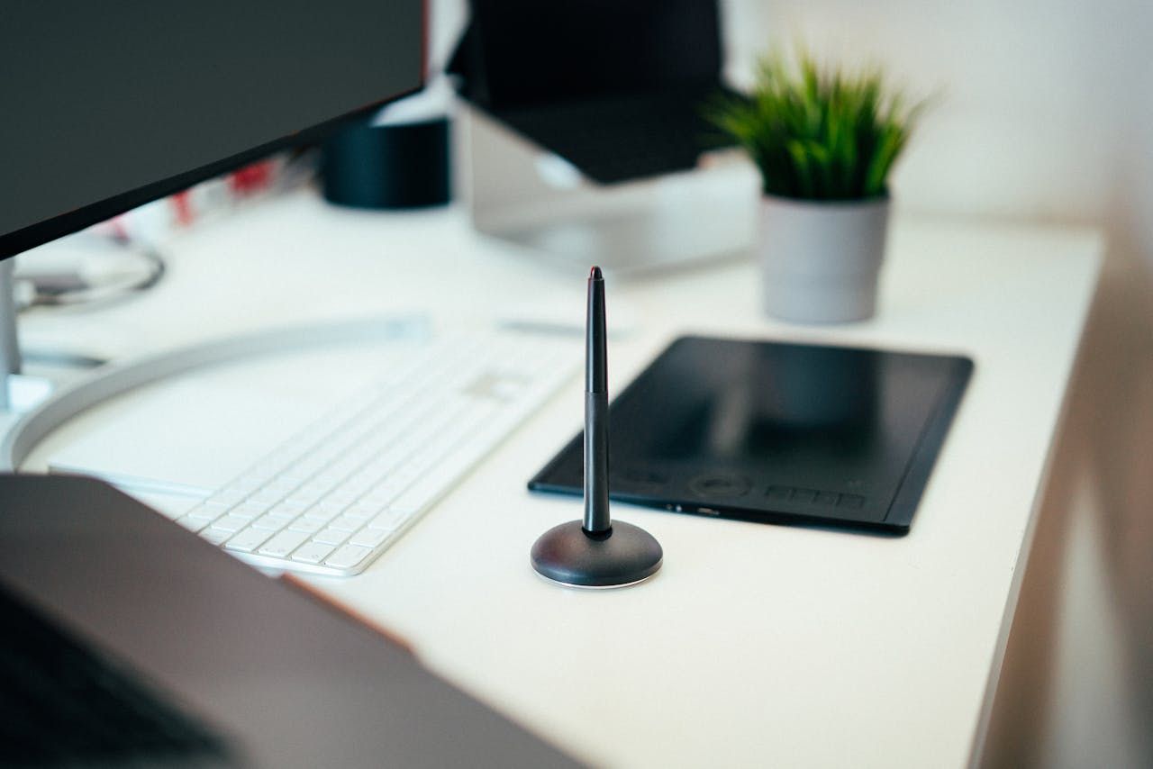 Stylus and drawing pad on an office desk